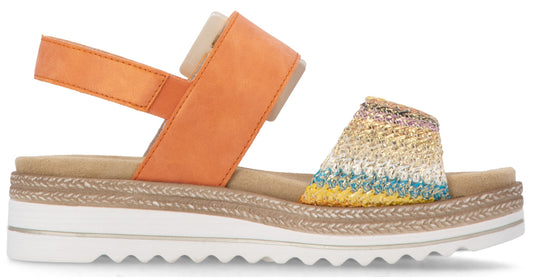Orange sandal with hook and loop closure, espadrille trim, and white platform sole.
