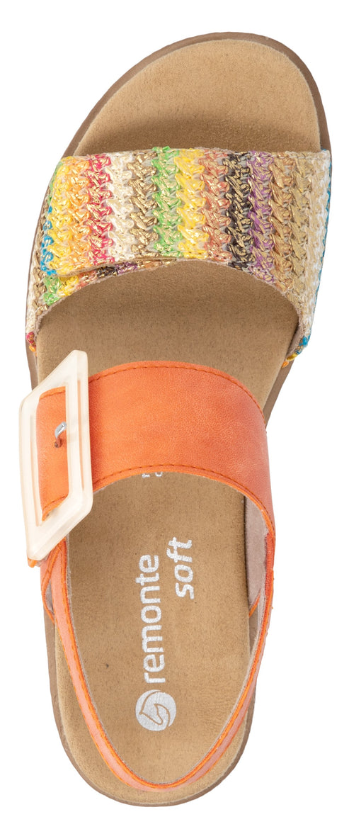A sandal with rainbow-colored woven strap and an orange strap with a cream square buckle; insole shows 'remonte soft' text.