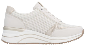 White sneaker with mesh upper and thick white sole.