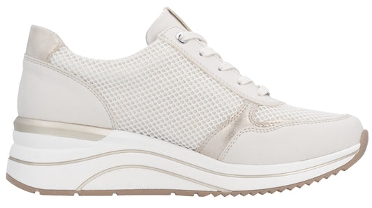 White sneaker with mesh upper and thick white sole.