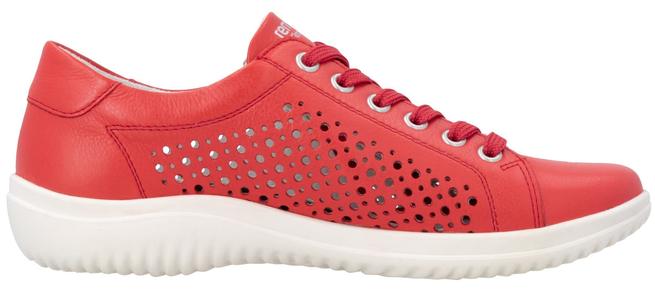 Red sneaker with laces and decorative perforations.