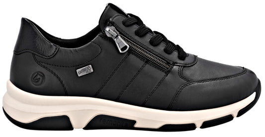 Black sneaker with side zipper and white sole.