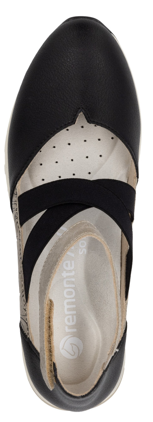 A black shoe with two crossing elastic straps.