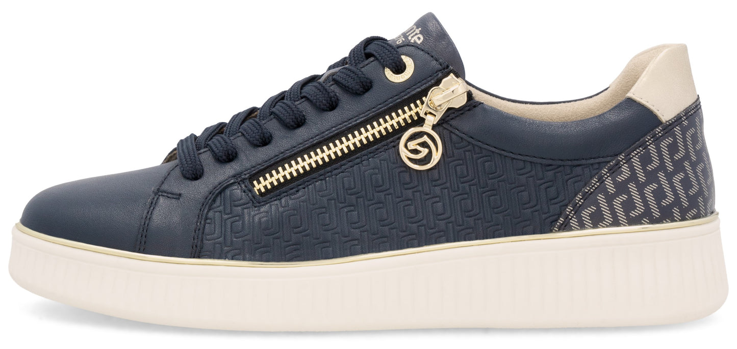 A navy blue sneaker with a decorative gold zipper, white sole, and patterned heel.