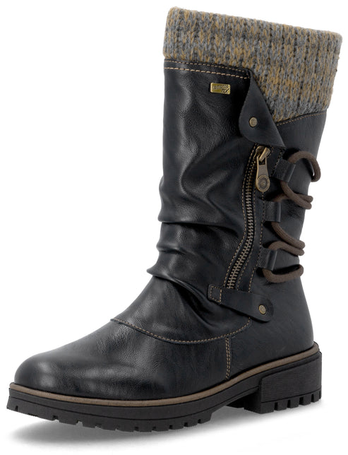 A black faux leather mid-calf winter boot with a slouchy upper, a knit wool-blend cuff at the top, a side zipper closure, and decorative wrap-around laces, all set on a thick lug sole.