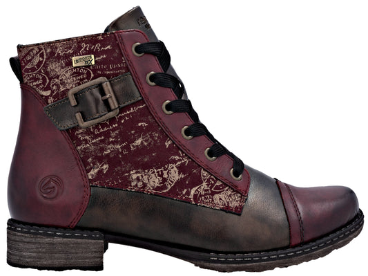 Ankle boot in burgundy and brown with buckle, laces, and low heel.