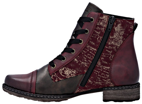 Ankle-high boot with mixed materials and side zipper. The toe, heel, and lace areas are dark burgundy, and the rest of the boot is decorated with printed beige graphics on a dark burgundy background.