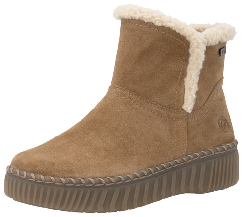A tan suede ankle boot with a white faux-shearling lining and cuff, featuring a thick, ribbed brown platform sole with a visible blanket stitch detail connecting the upper to the sole.