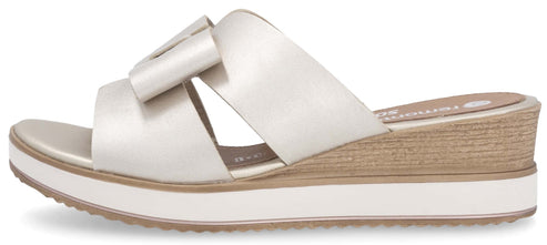 Wedge sandal with a bow detail.