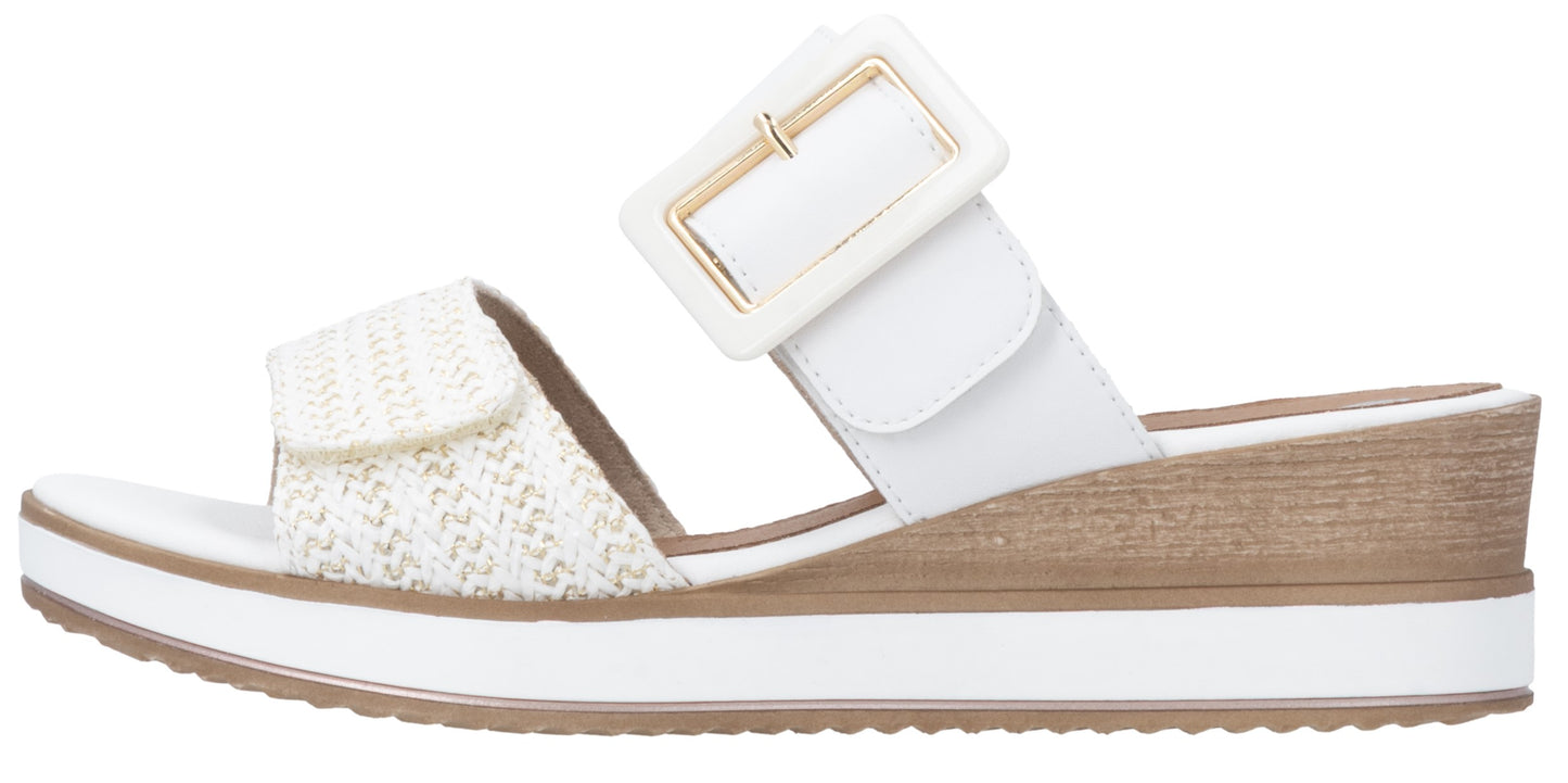 Sandals with white woven strap and adjustable white buckle strap on a white platform sole.