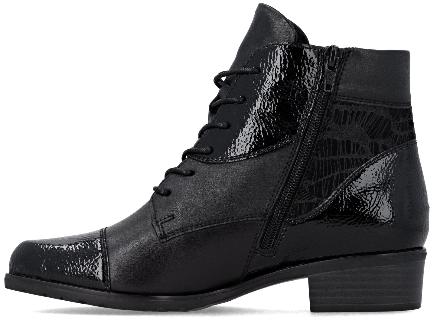 A black ankle boot with a low block heel, lace-up front, and a side zipper, featuring a mix of matte leather and glossy, textured patent leather panels with a subtle abstract pattern on the quarter.