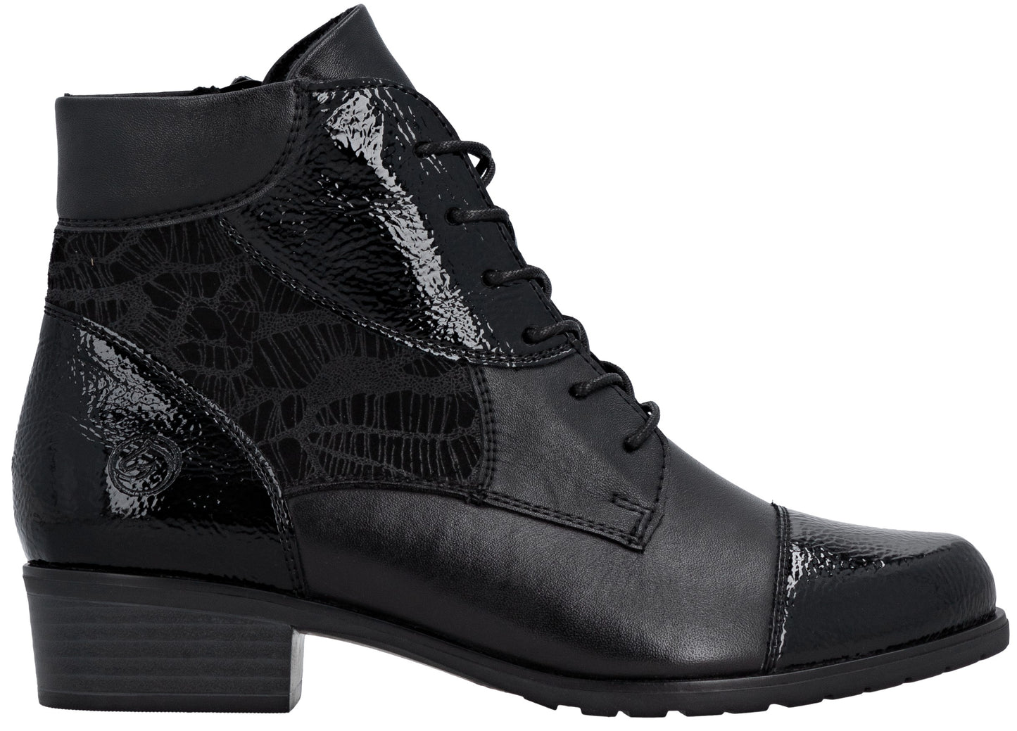 A black ankle boot with a lace-up front, a round toe, and a low block heel, featuring a mix of matte and patent leather textures with an embossed lace pattern on the side panel.