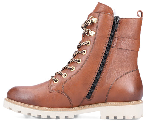 Tan leather ankle boot with side zipper, lace-up front and white lug sole.