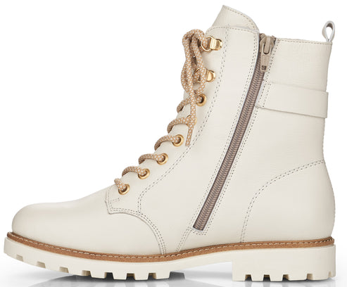 An off-white combat boot with zipper, eyelets, and laces.
