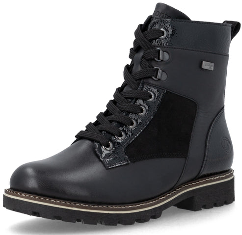 A black leather lace-up boot with a textured panel near the eyelets, a thick lugged sole, and a silver logo tag on the ankle.