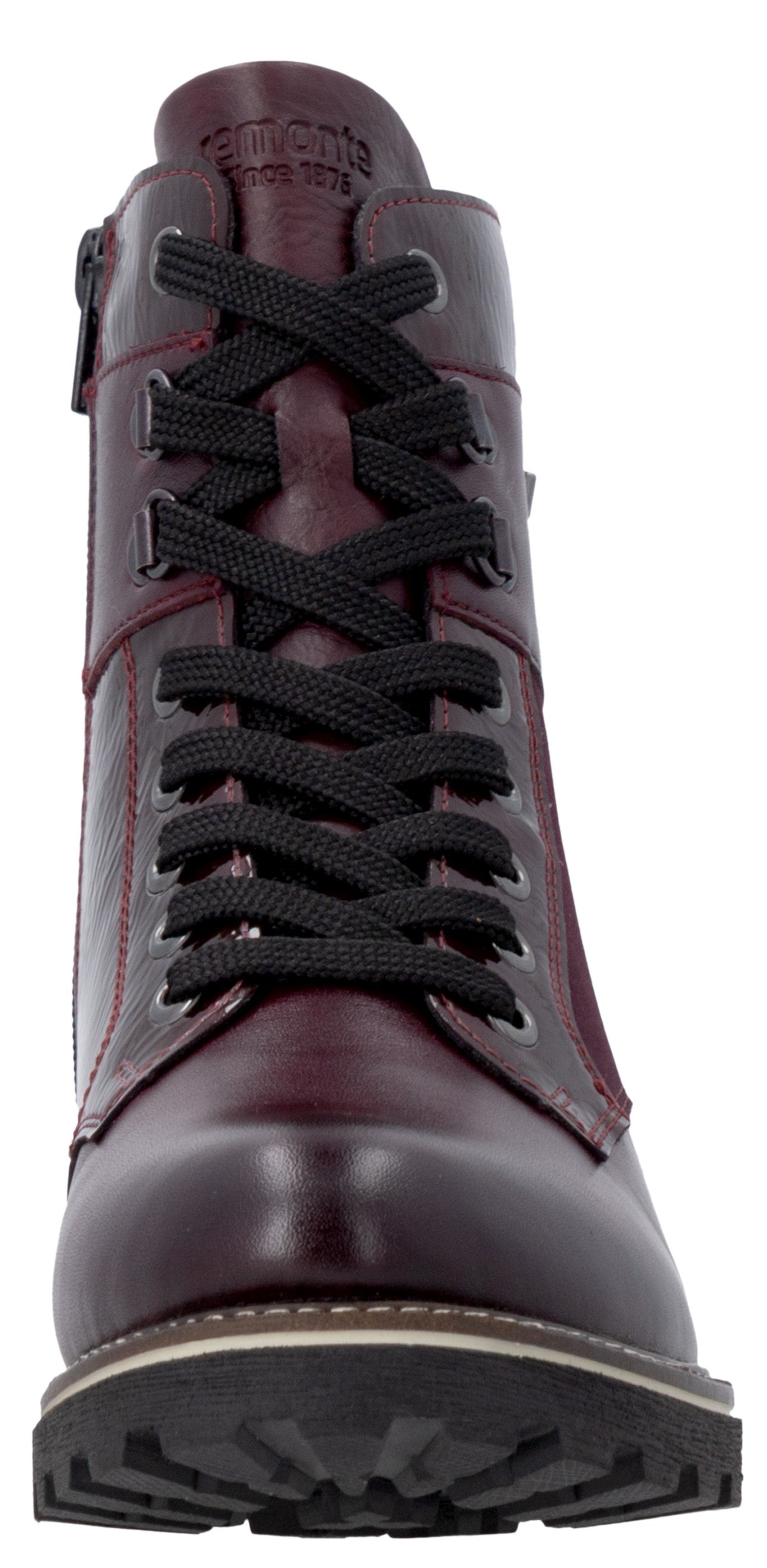 A front view of a deep burgundy leather lace-up ankle boot with a black lug sole and a small brand logo embossed at the top of the tongue.