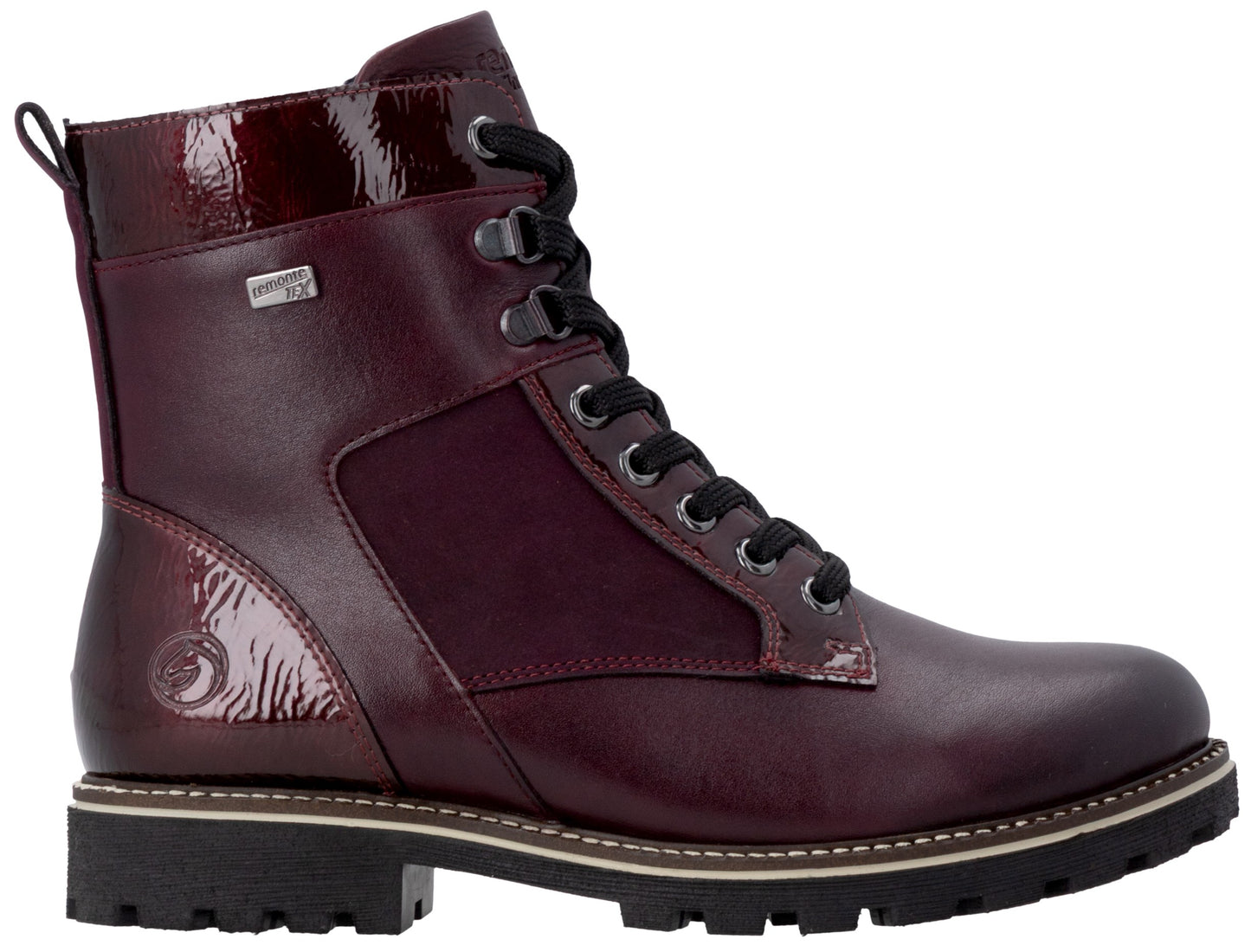 A maroon ankle boot with a lace-up front, a thick black lug sole, and a combination of smooth and patent leather-like panels with black laces and metallic hardware.