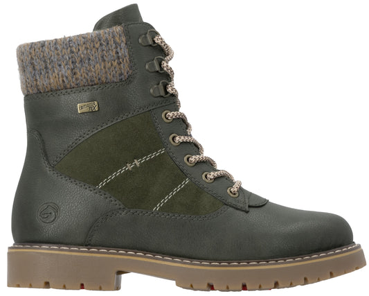 A dark olive green women's lace-up ankle boot featuring a textured knit collar, a leather-like lower boot with a suede side panel, decorative stitching, and a sturdy brown lug sole.