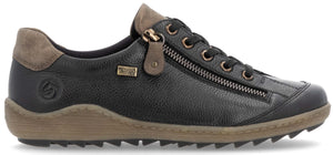 A black leather sneaker with brown suede accents at the heel and tongue, featuring a side zipper, black laces, and a rugged brown textured sole.