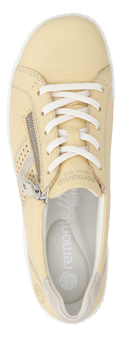 Beige sneaker with white laces and a side zipper.