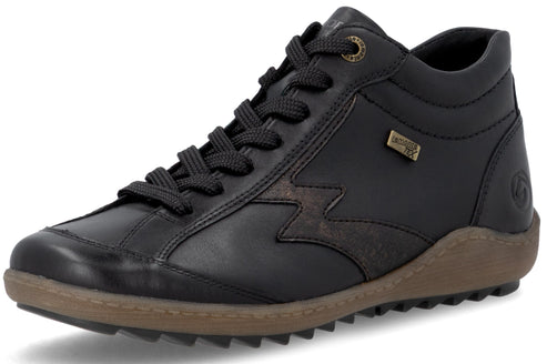 A black leather sneaker-boot featuring black laces, a zig-zag textured side panel, a metallic logo tag, and a brown, thick, treaded rubber sole.