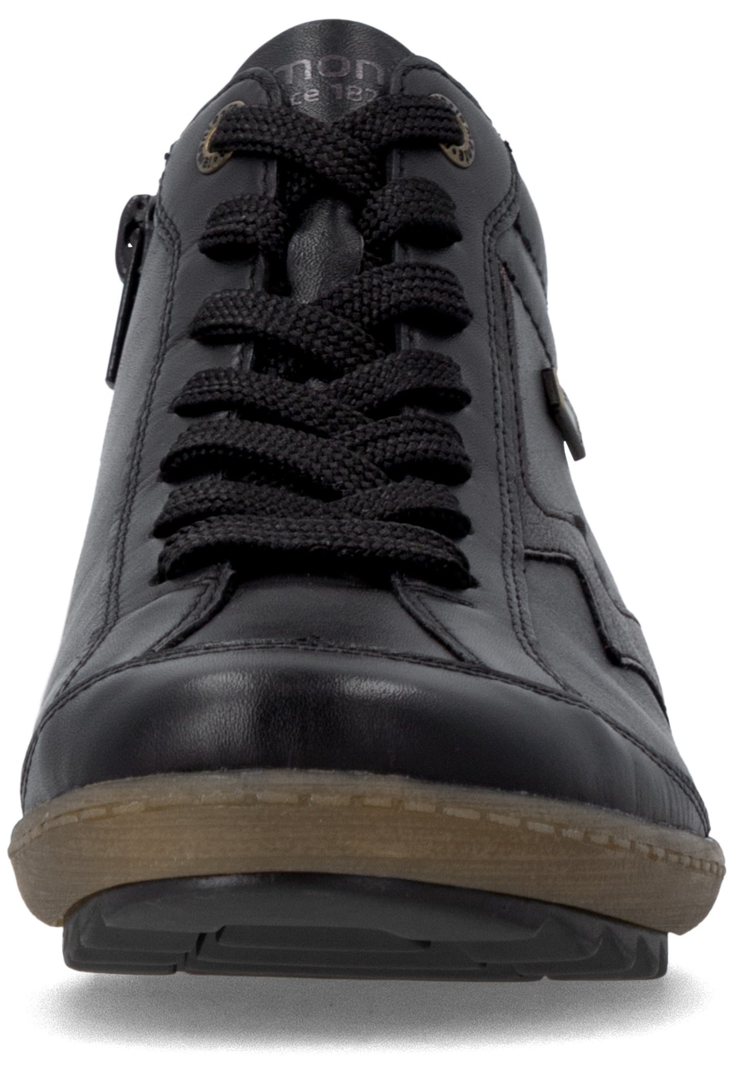 A close-up front view of a black leather lace-up sneaker with a brown rubber midsole and black outsole, featuring a side zipper on the inner panel and the word 'mon' visible on the tongue.