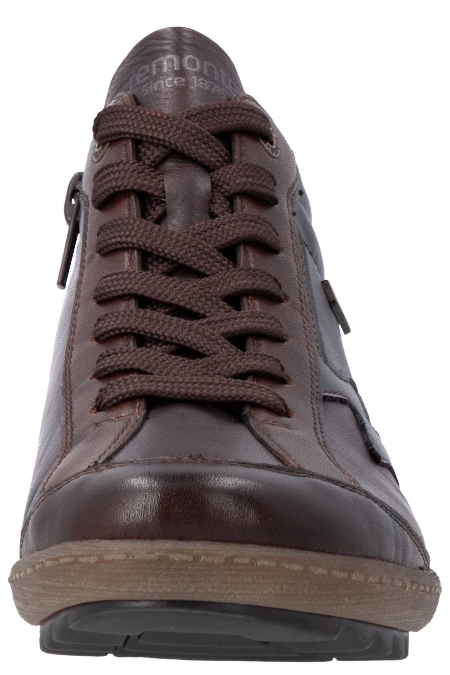 A brown leather casual shoe shown from a front-facing perspective, featuring dark brown laces, a side zipper, and a textured brown rubber sole with a visible 'remonte' brand logo on the tongue.