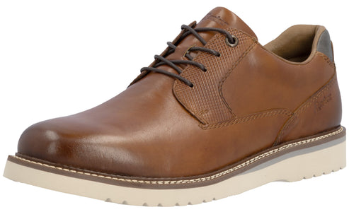 A tan leather derby shoe with dark brown laces, a textured leather panel on the side, and a thick, white ridged rubber sole.
