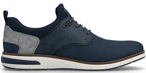 A dark blue low-top sneaker with matching laces and a white sole.