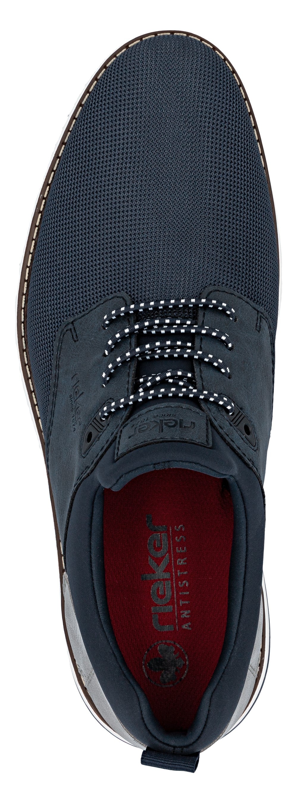 A navy blue shoe with dotted laces and a red insole that says "rieker ANTISTRESS".