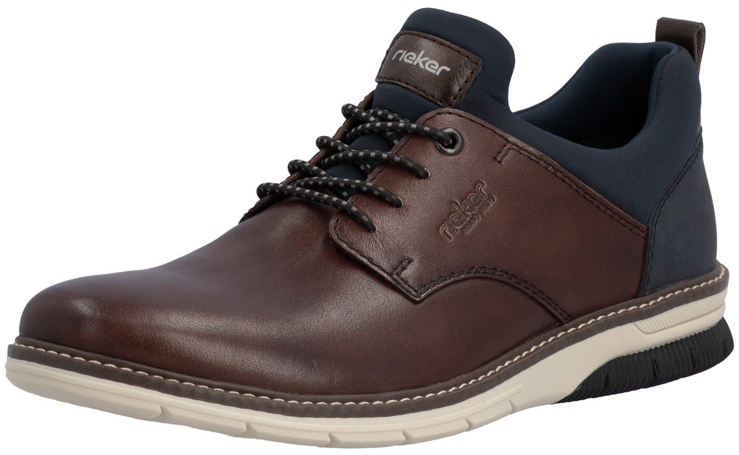 A brown leather casual lace-up shoe with a navy blue padded collar and tongue, featuring dark-speckled laces, a cream-colored midsole, and a black textured outsole, with the brand name 'rieker' visible on the tongue and side panel.