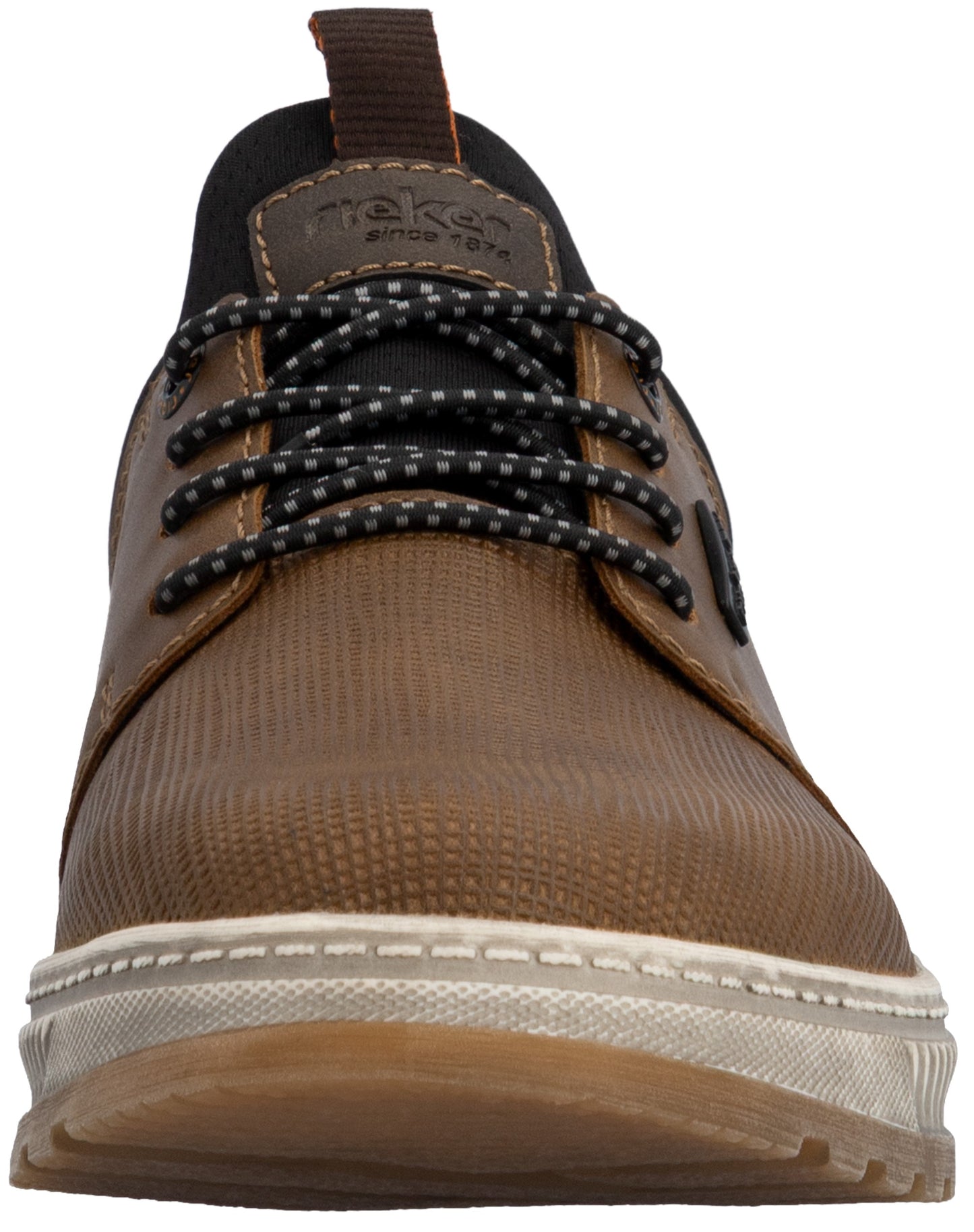 A brown, textured low-top shoe viewed from the front, featuring black laces with white speckles, a black padded tongue, and a thick, ridged light-colored sole with a visible 'rieker' brand tag on the tongue.