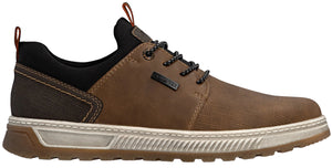 A brown and black casual sneaker with a textured brown leather and fabric upper, a white ridged midsole, a dark rubber outsole, and black laces with white speckles, featuring a small black tag reading PRIMETEX on the side.