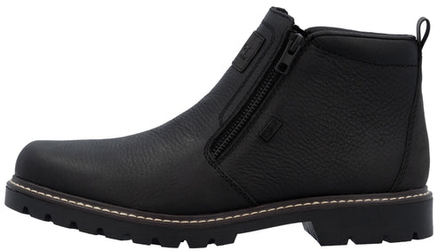 A black leather ankle boot with a side zipper closure, a padded collar, a rear pull tab, and a textured black lugged rubber sole with visible white stitching along the welt.