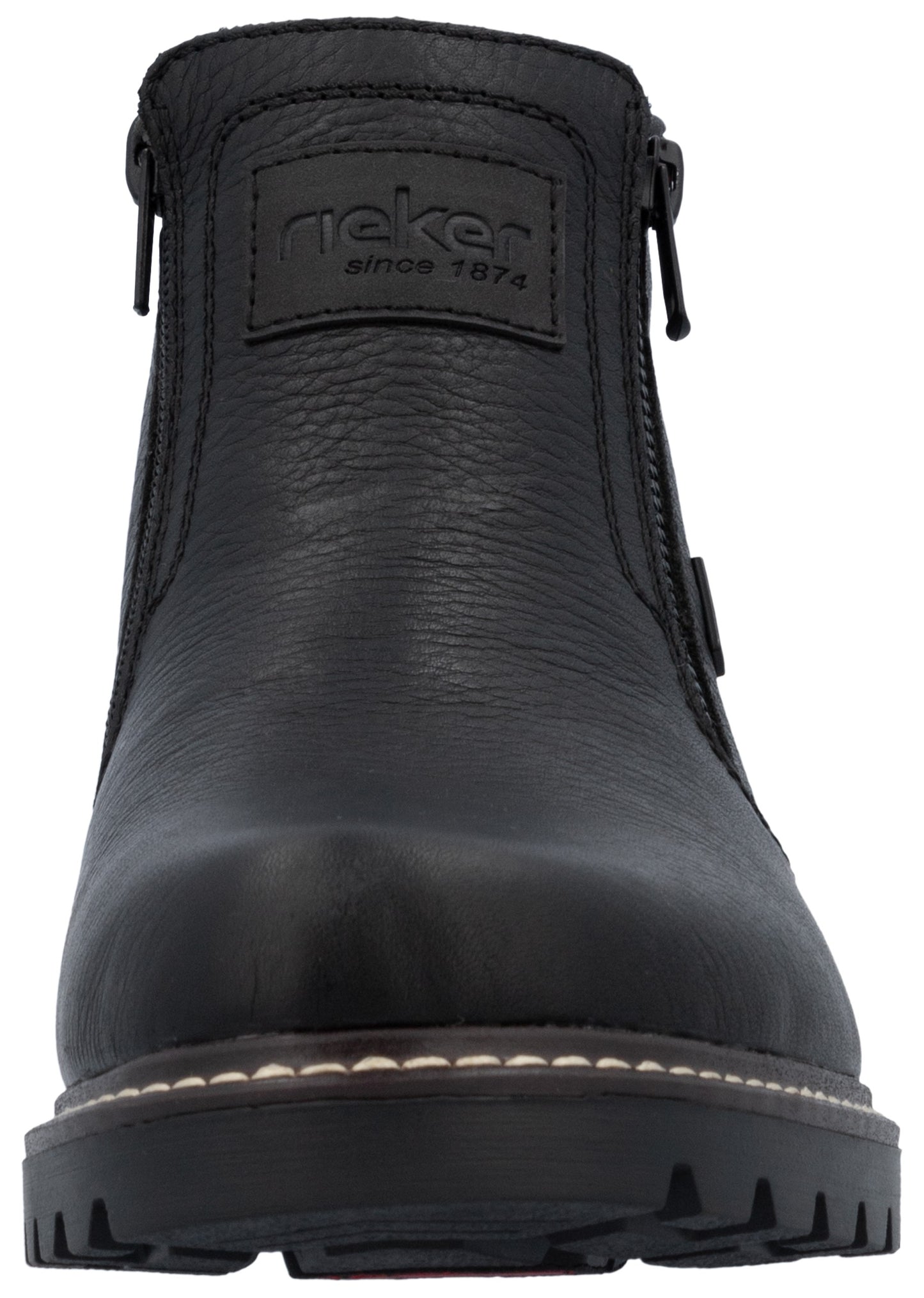 A black leather ankle boot with a rugged, lugged sole, visible stitching along the base, and zippers on both sides, featuring a textured brand patch on the upper front.