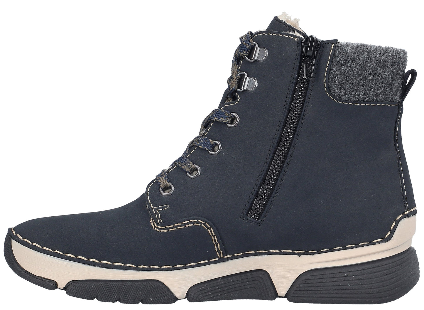 A dark navy blue ankle boot with a lace-up front, a side zipper, a gray textured collar, cream-colored midsole stitching, and a thick, ridged black and cream rubber sole.
