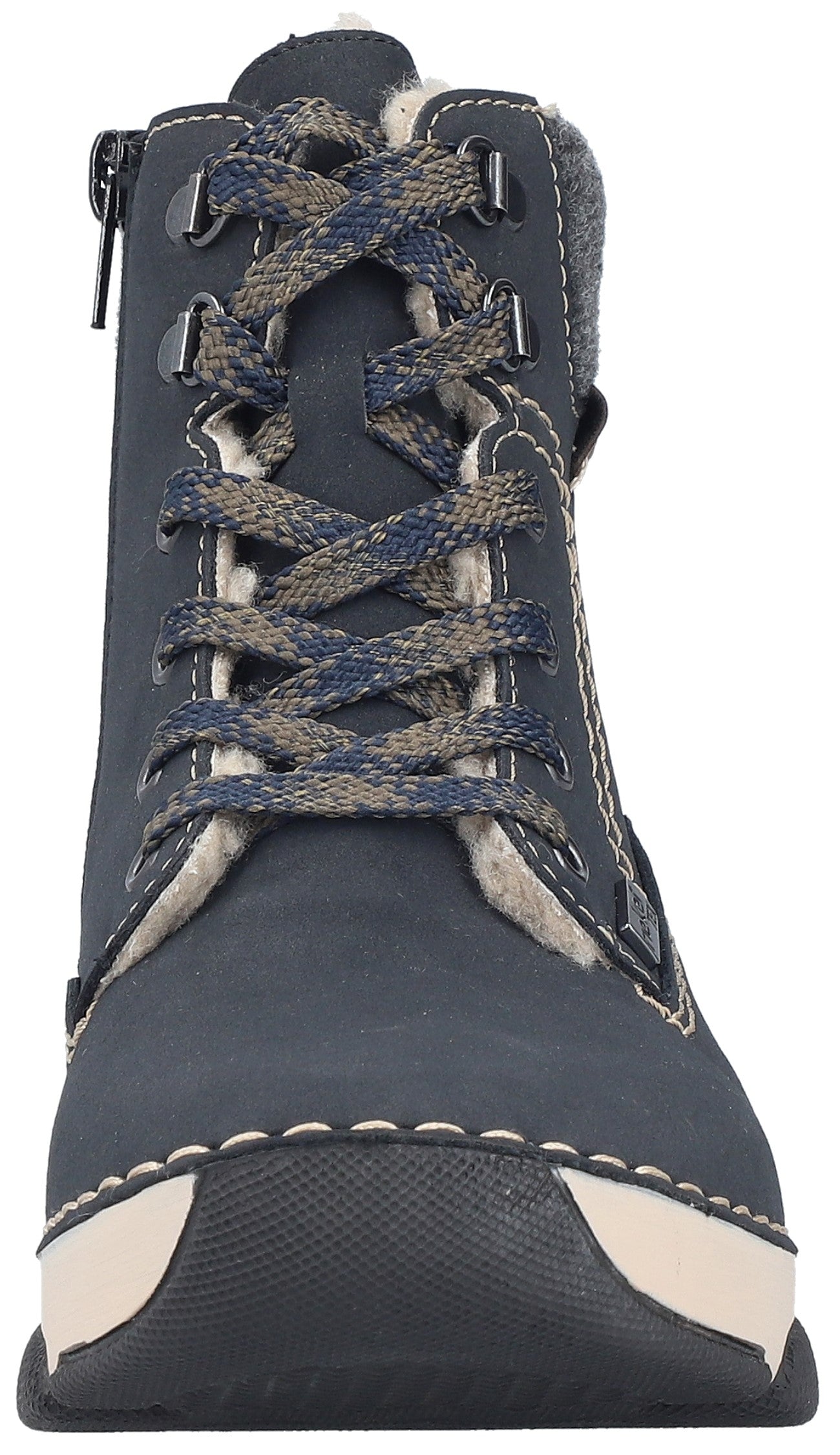 A close-up, front-facing view of a dark navy blue, mid-calf, lace-up winter boot. The boot features a textured dark blue and light gray lace, a light-colored faux fur lining, thick cream-colored contrast stitching around the base, a black rubber sole, and a silver side zipper.