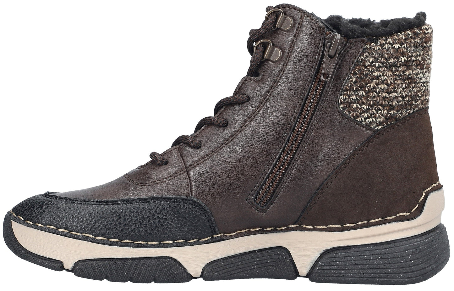 A brown leather ankle boot with a black textured leather toe cap, a side zipper, black laces, and a knit cuff around the collar, set atop a thick, two-toned cream and black rubber sole.