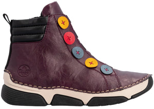 A maroon high-top boot features decorative multi-colored buttons in yellow, red, and blue lining the side. It has a black padded ankle collar, a white midsole with visible stitching, and a black treaded outsole.
