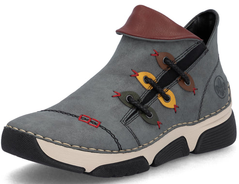 A gray ankle boot with a brown cuff, decorative yellow and brown leather lacing accents, red stitching details, and a thick, chunky beige and black rubber outsole.