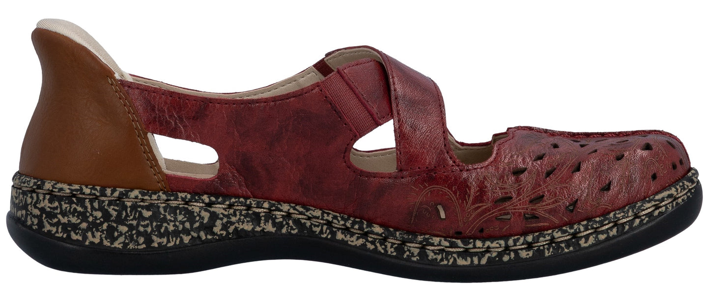A red leather shoe with a brown heel.