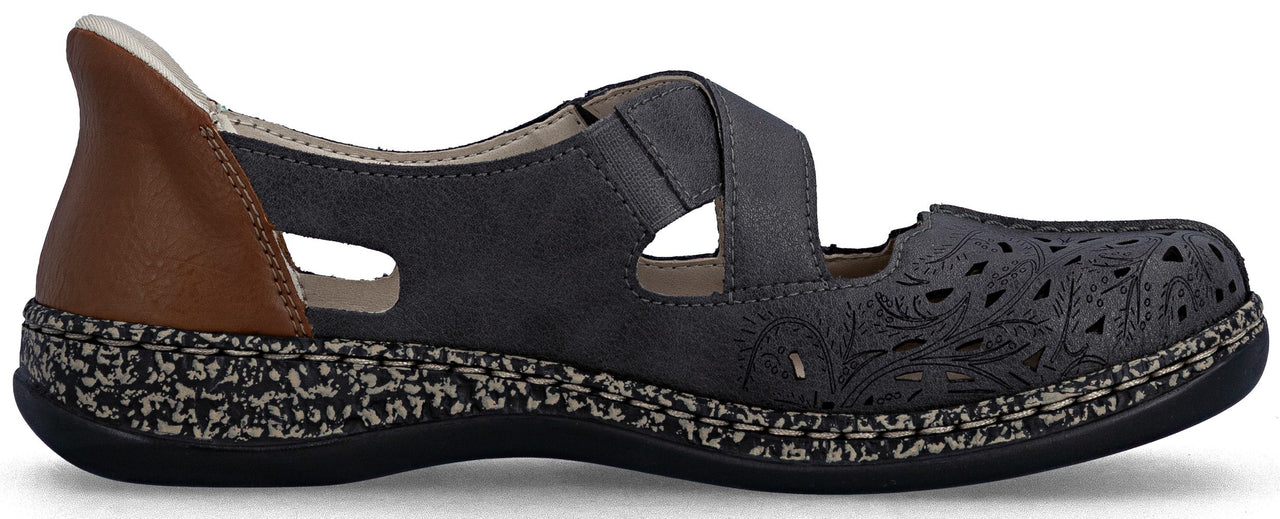 A women's gray shoe with a brown heel and a decorative floral cutout pattern on the toe.