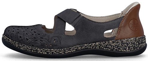A gray shoe with a strap, decorative perforations, and a brown heel.