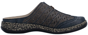 Navy blue leather clog shoe with decorative cutout pattern and speckled sole.