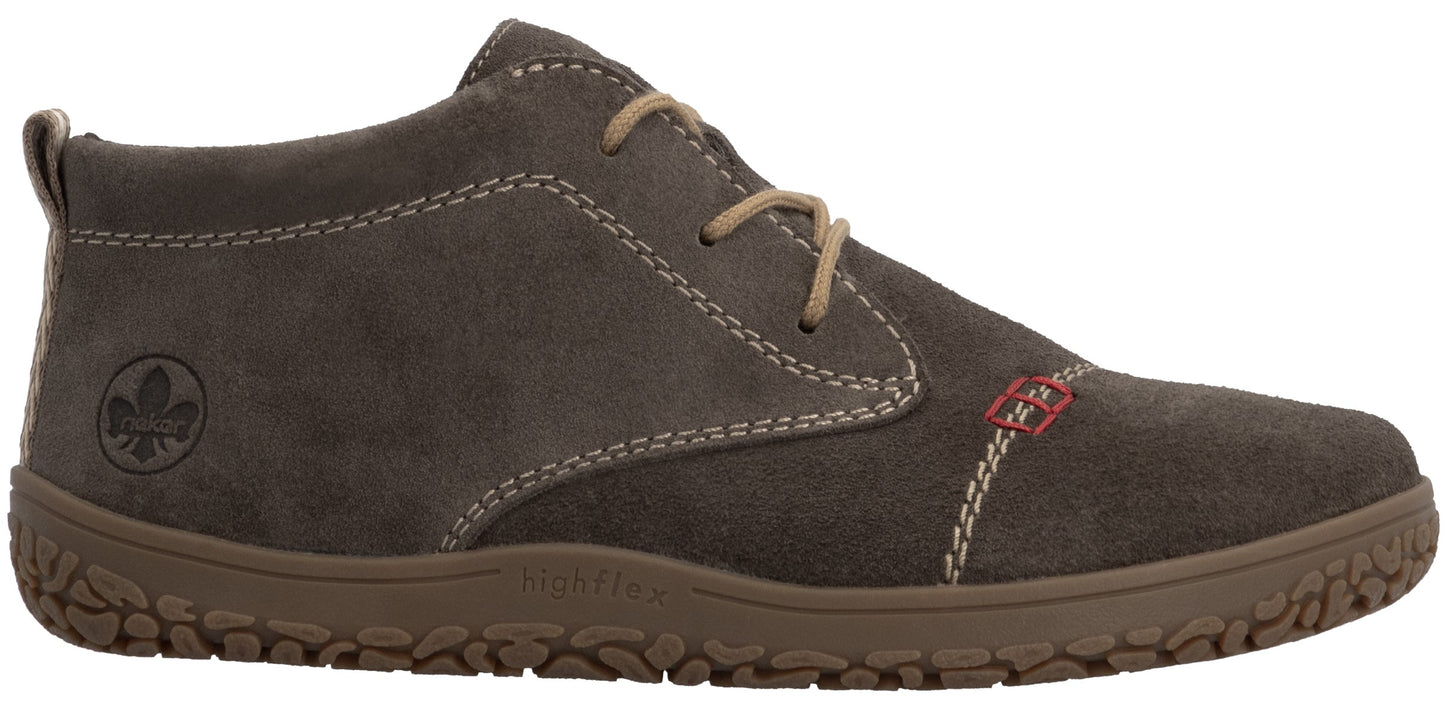 A brown suede ankle boot with tan laces, white topstitching, a textured rubber sole, and a Rieker logo embossed on the heel area.