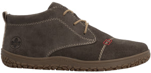 A brown suede ankle boot with tan laces, white topstitching, a textured rubber sole, and a Rieker logo embossed on the heel area.