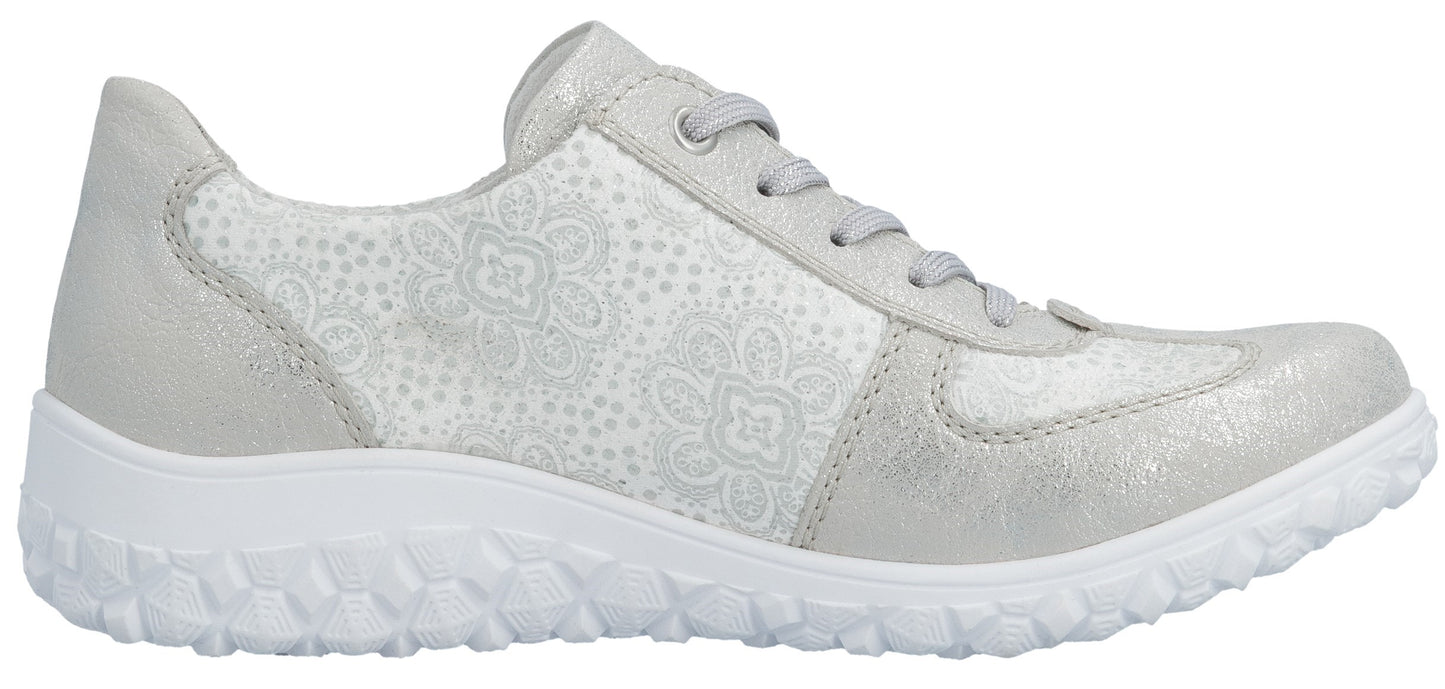 A silver sneaker with white detailing and white soles.