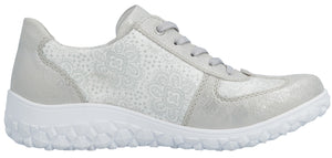 A silver sneaker with white detailing and white soles.