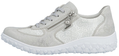 A silver Rieker women's sneaker with a white sole and a zipper.
