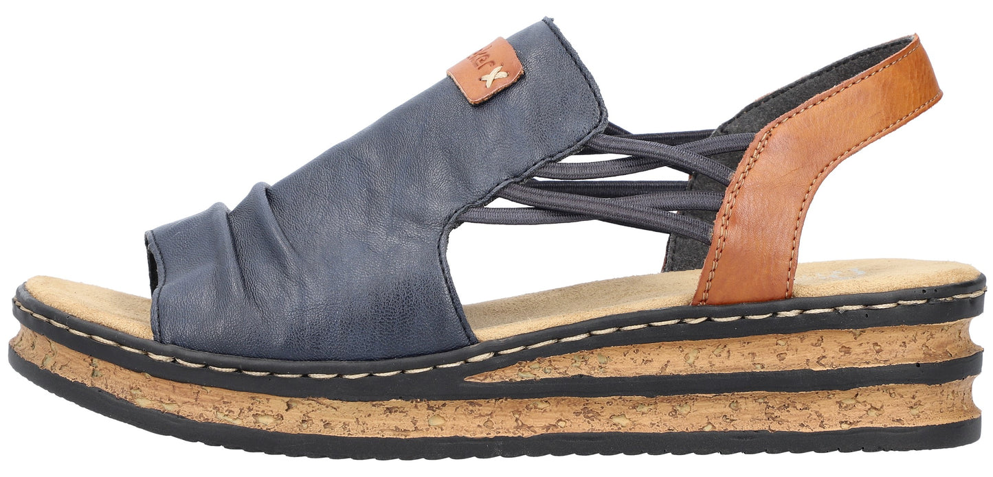 A sandal with a navy-blue toe-covering, a tan heel strap, and multiple elastic straps connecting the two.